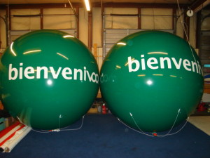 two 7ft. green color big helium balloons with printing